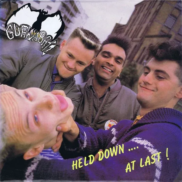 Cover of Guana Batz – Held Down... At Last!