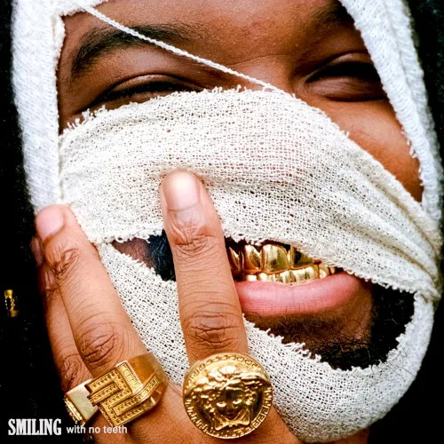 Cover of Genesis Owusu – Smiling with No Teeth