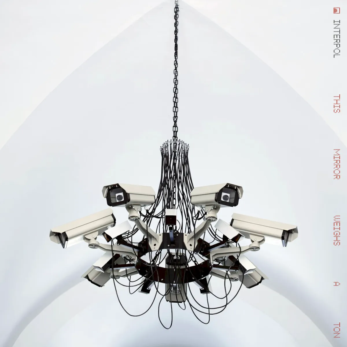 Cover of Interpol – This Mirror Weighs a Ton