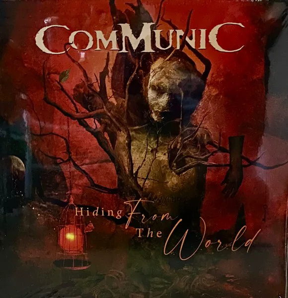 Obal alba Communic – Hiding From the World
